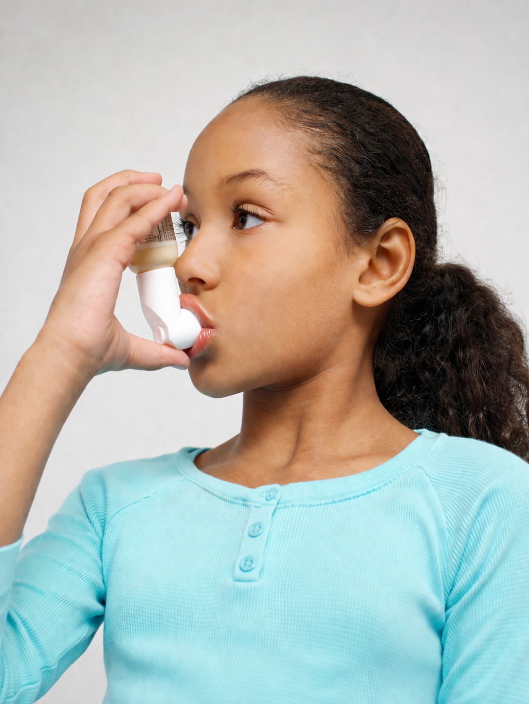 Child using an inhaler