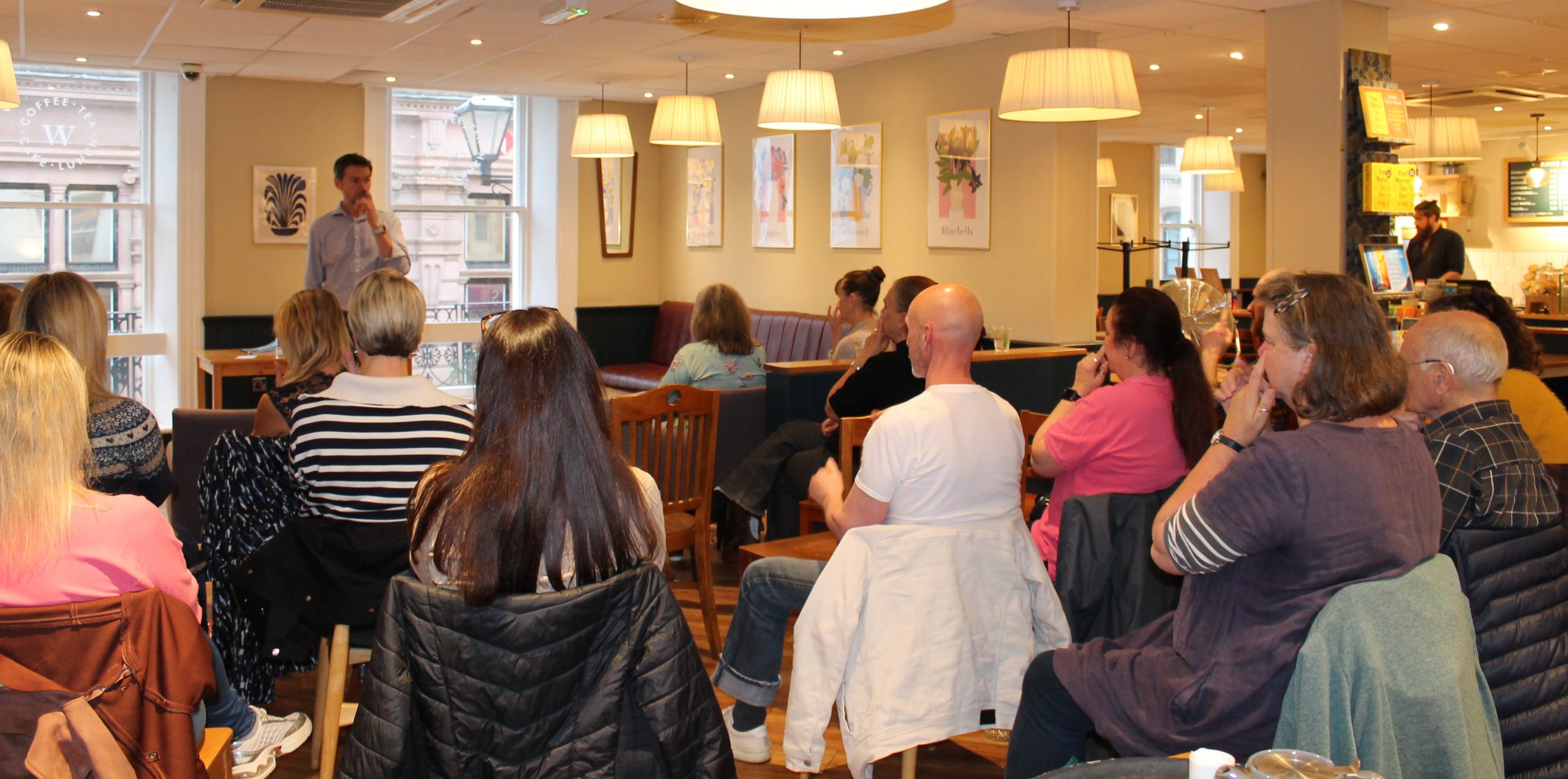 Audience listening during a cafe talk